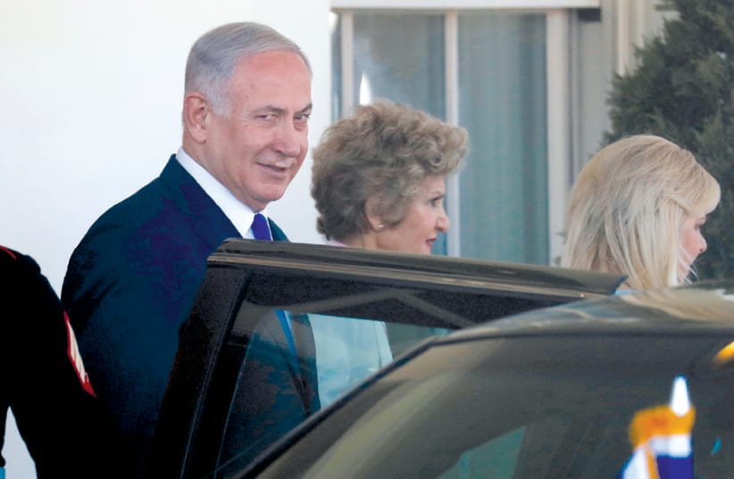 PRIME MINISTER Benjamin Netanyahu and his wife, Sara, (right) depart from the White House  (photo credit: REUTERS/LEAH MILLIS)