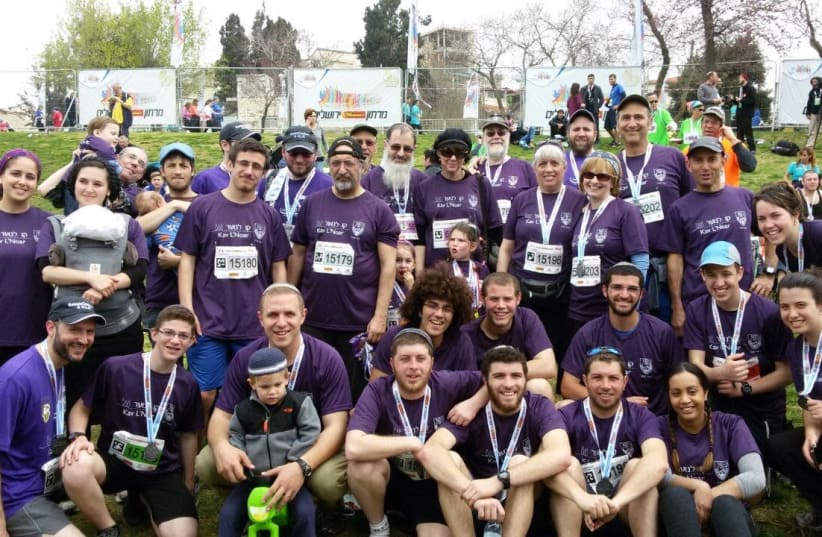 American rabbis with Kav L'Noar running the Jerusalem marathon (photo credit: DANA LAURA LAVIE)