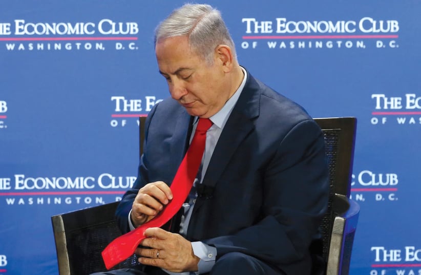 ME MINISTER Benjamin Netanyahu pauses during an interview at the Economic Club of Washington, DC, on March 7, 2018. (photo credit: REUTERS)