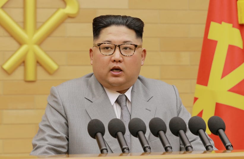 North Korea's leader Kim Jong Un speaks during a New Year's Day speech in this photo released by North Korea's Korean Central News Agency (KCNA) in Pyongyang on January 1, 2018 (photo credit: KCNA/ REUTERS)