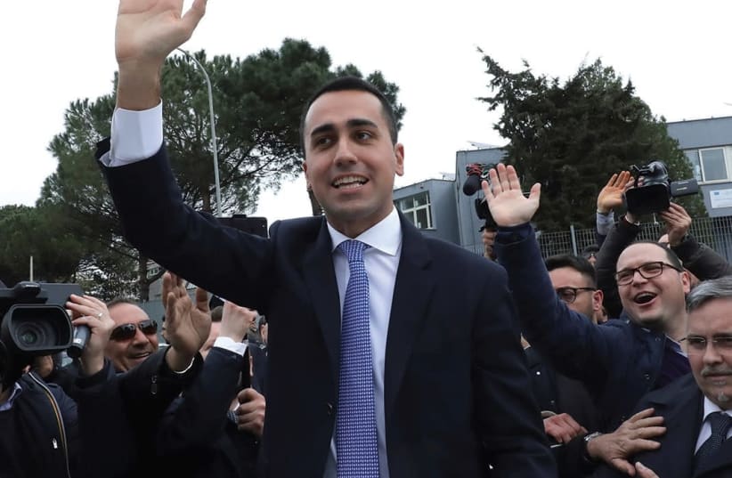 5-STAR MOVEMENT leader Luigi Di Maio waves as he leaves after casting his vote at a polling station in Pomigliano d’Arco, Italy. (photo credit: REUTERS)