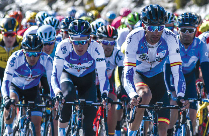 RIDERS OF the Israel Cycling Academy stick together during stage four of the 2018 Volta a la Comunitat Valenciana in eastern Spain in early Februrary. From left: Guy Niv (Israel), Ben Hermans (Belgium) and Ruben Plaza (Spain) (photo credit: NOA ARNON)