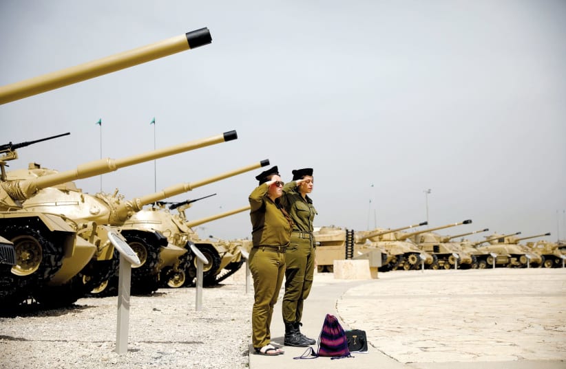 SOLDIERS STAND at attention during a ceremony at the Armored Corps museum at Latrun. (photo credit: REUTERS)