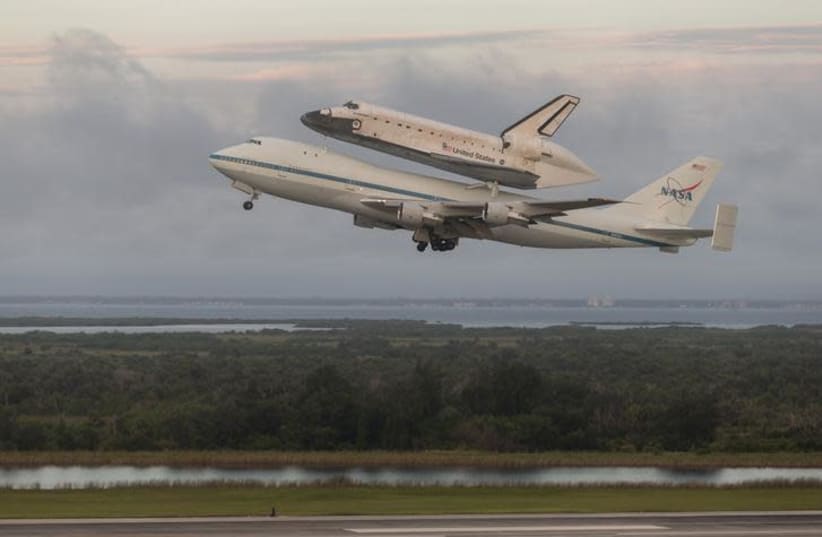 space shuttle endeavor taking off (photo credit: REUTERS/SCOTT ANDREWS/NASA/HANDOUT)