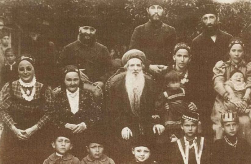 A photograph of Rabbi Chaim Chizkiyahu Medini, considered the ‘Chacham’ of Krymchaki Jews, with his wife, daughters, sons-in-law, and grandchildren, taken shortly before he returned to Palestine in 1899 (photo credit: COURTESY OLEG KUZNETSOV)
