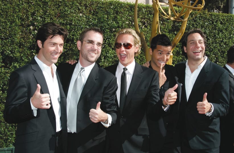 The cast of the original "Queer Eye for the Straight Guy" (photo credit: REUTERS)