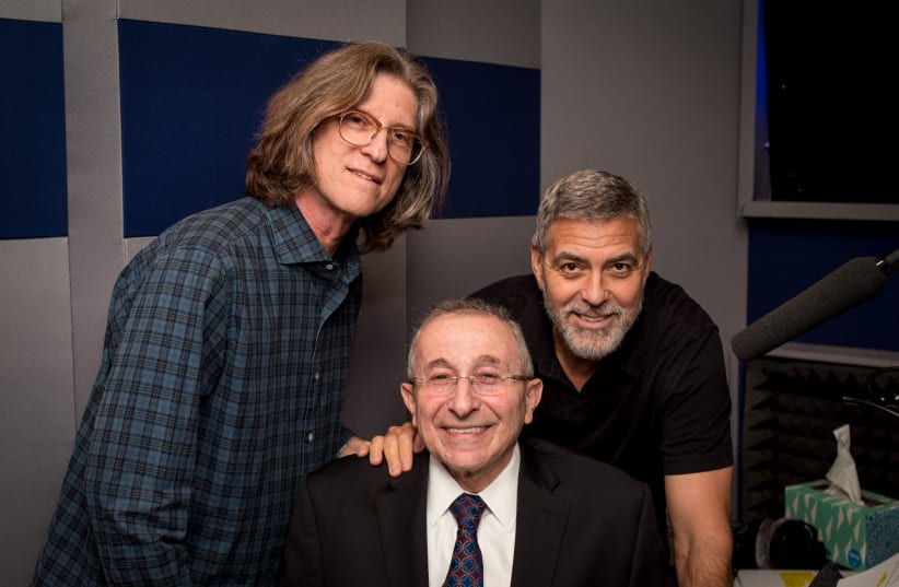 GEORGE CLOONEY, Rabbi Marvin Hier and Richard Trank pose for a photo in the recording booth (photo credit: Courtesy)