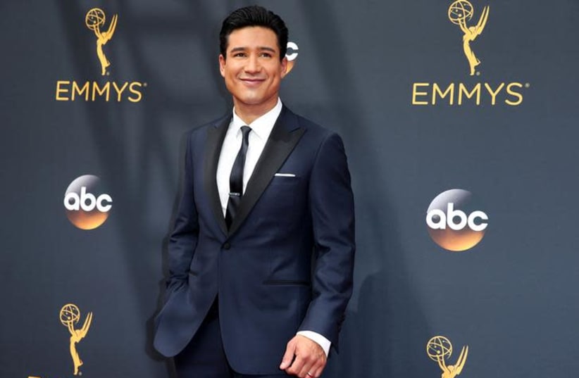 Television personality Mario Lopez arrives at the 68th Primetime Emmy Awards in Los Angeles, California, US, September 18, 2016. (photo credit: REUTERS/LUCY NICHOLSON)