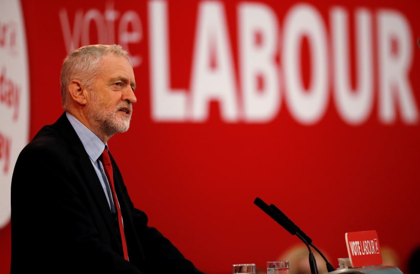 The leader of Britain's opposition Labour Party, Jeremy Corbyn, delivers a speech in Manchester, Britain, March 22, 2018. (photo credit: REUTERS/PHIL NOBLE)