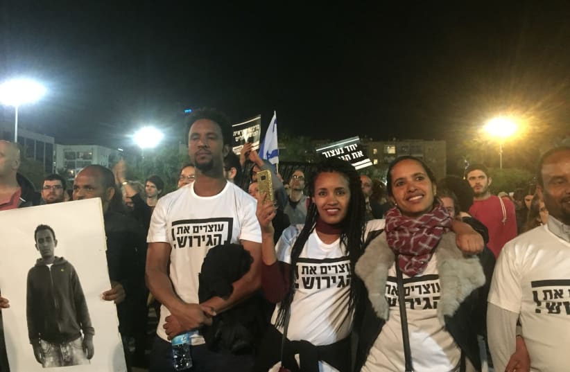 Participants in a protest in Tel Aviv against deportation of asylum seekers, March 2018 (photo credit: TAMARA ZIEVE)