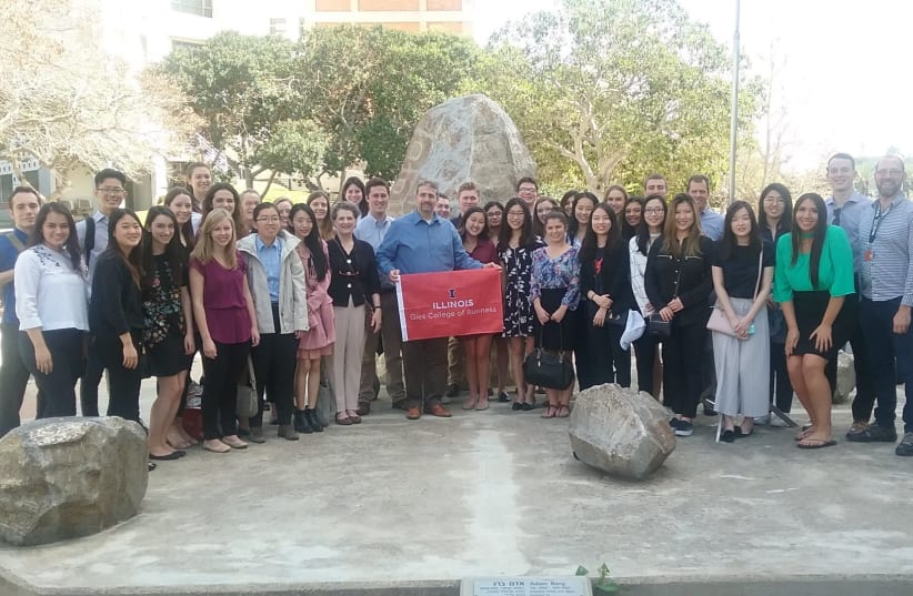 The 35 students from the Gies College Business School, which forms part of the University of Illinois at Urbana–Champaign, meet with former US Ambassador Dan Shapiro while visiting Israel last week. (photo credit: FACEBOOK)