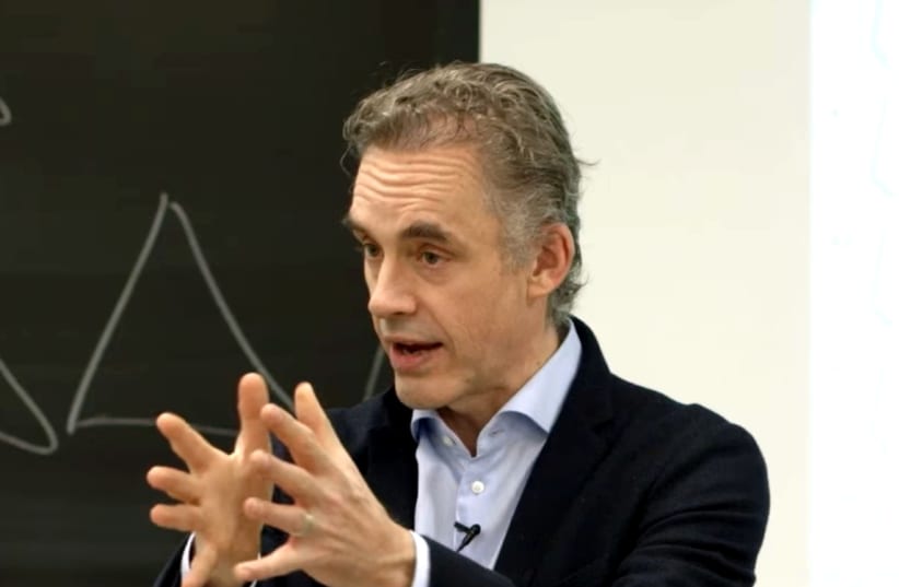 Jordan Peterson delivering a lecture at the University of Toronto in 2017 (photo credit: ADAM JACOBS)