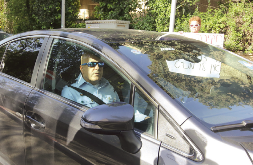 Police Inspector arrives at Prime Minister Benjamin Netanyahu’s official residence in Jerusalem yesterday to question him in connection with Case 4000. (photo credit: MARC ISRAEL SELLEM/THE JERUSALEM POST)