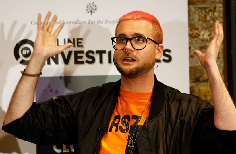 Christopher Wylie, a whistleblower who formerly worked with Cambridge Analytica, at the Frontline Club in London, Britain (photo credit: HENRY NICHOLLS/REUTERS)