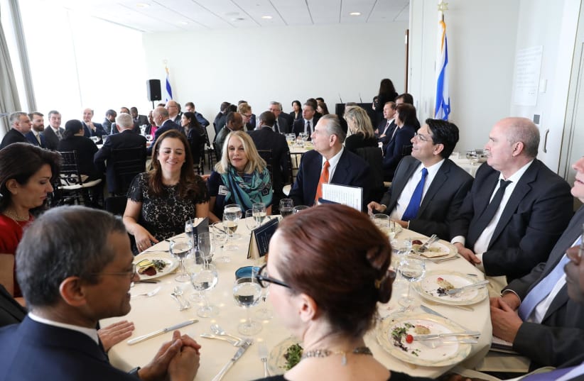 Ambassadors and senior diplomats join Israeli Ambassador to the UN Danny Danon at a mock Passover seder (photo credit: ISRAEL MISSION TO THE UN)