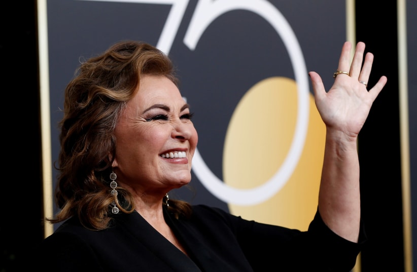 Actress Roseanne Barr reacts as she arrives at the 75th Golden Globe Awards in Beverly Hills, California, U.S., January 7, 2018.  (photo credit: MARIO ANZUONI/REUTERS)