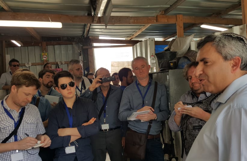 Ze'ev Elkin, Jerusalem affairs minister (right), speaks to a group of European journalists during a recent tour of the City of David (photo credit: Courtesy)