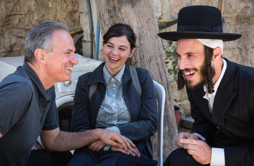 (FROM LEFT) Director Avi Nesher on the set of ‘The Other Story’ with actress Joy Rieger and singer Natan Goshen (photo credit: MICHAL FATTAL)