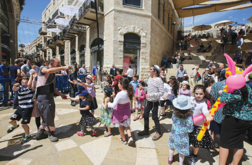  Celebrating Hol Hamoed throughout Mamilla Mall and the Old City (photo credit: MARC ISRAEL SELLEM)