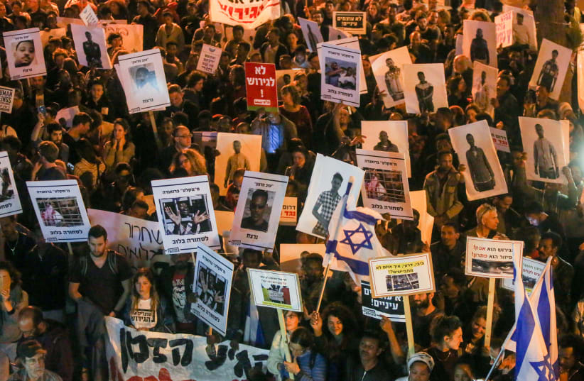 Protestors demonstrate against Israel's plan to deport asylum-seekers (photo credit: MARC ISRAEL SELLEM/THE JERUSALEM POST)