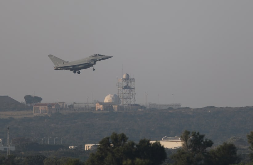 A British fighter jet takes off from an RAF base in Cyrpus to strike Syria  (photo credit: YIANNIS KOURTOGLOU/REUTERS)