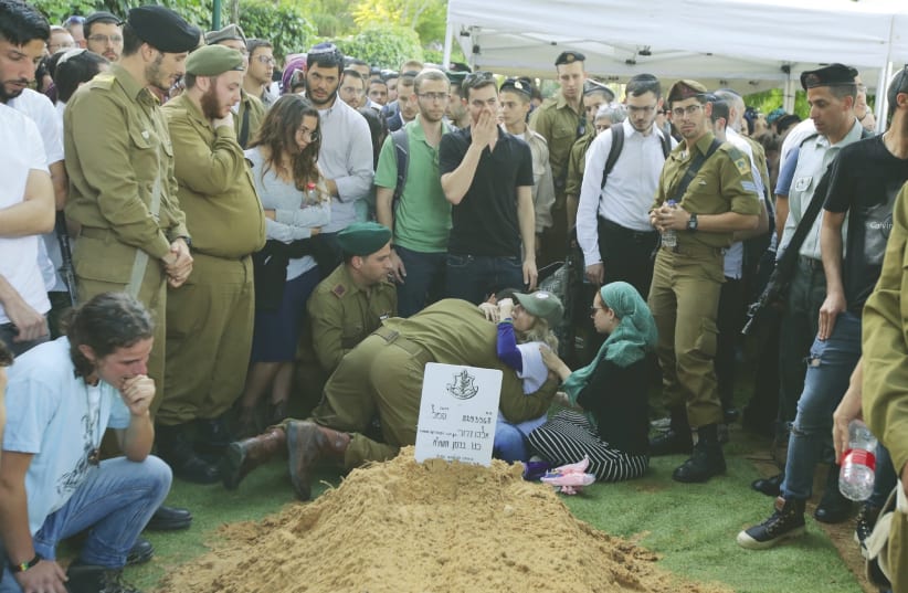 SGT. ELIYAHU DRORI, 22, an American-born soldier from Beit Shemesh, is buried at the Mount Herzl Military Cemetery in Jerusalem on Sunday (photo credit: MARC ISRAEL SELLEM/THE JERUSALEM POST)