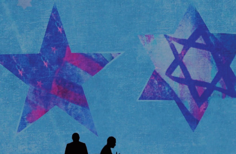 The backdrop of the stage at last year’s AIPAC conference in Washington, DC (photo credit: REUTERS)