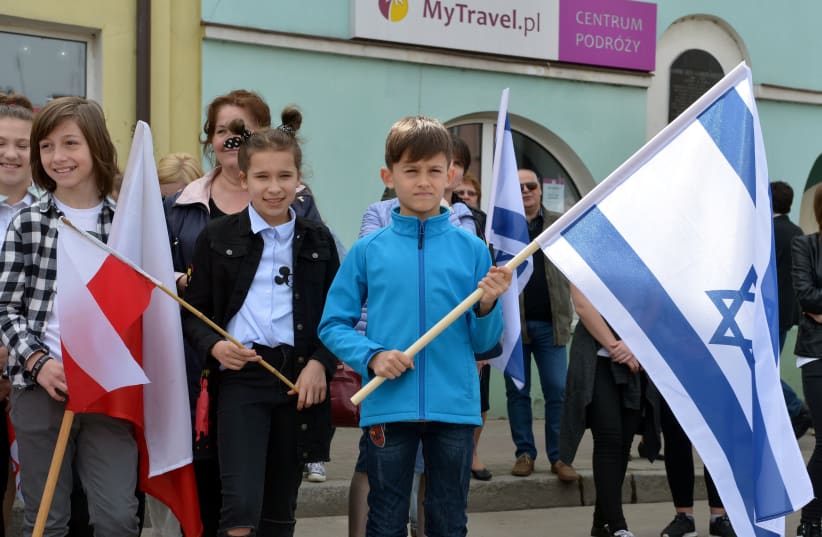 Polish children holding Israeli and Polish flags in Plonsk, the birthtown of David Ben-Gurion  (photo credit: YOSSI ZELINGER)