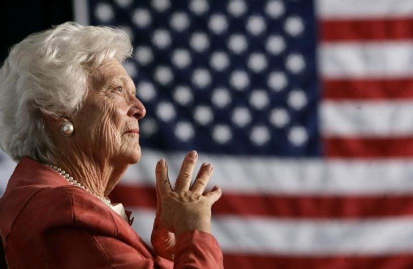 Former US first lady Barbara Bush listens to her son, President George W. Bush, as he speaks at an event on social security reform in Orlando, Florida March 18, 2005 (photo credit: REUTERS/JASON REED)