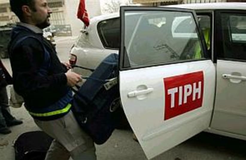 tiph car leaves hebron (photo credit: AP)