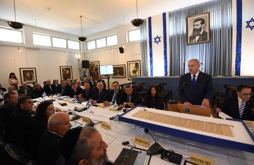 Prime Minister Benjamin Netanyahu addresses the cabinet at independence hall in Tel Aviv in honor of Israel's 70th Independence Day, April 2018 (photo credit: GPO)