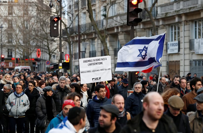 People participate in a unity rally after the murder of French Holocaust survivor Mireille Knoll in Paris (photo credit: GONZALO FUENTES / REUTERS)