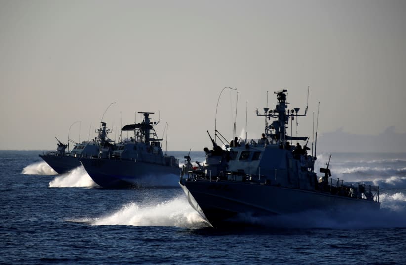 Israeli navy patrol vessels take part in a drill simulating the targeting of an infiltrated enemy vessel and the evacuation of a patrol boat, in the Mediterranean Sea off the coast of Ashdod, southern Israel November 8, 2016. (photo credit: AMIR COHEN/REUTERS)