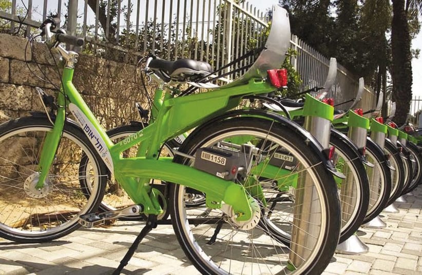 A bicycle rack as part of Tel Aviv's Tel-O-Fun bike-sharing program. (photo credit: Wikimedia Commons)