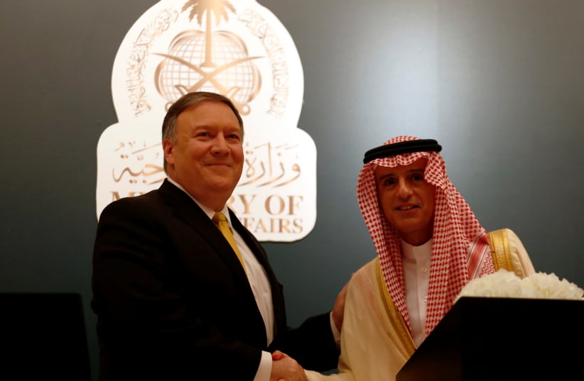 U.S. Secretary of State Mike Pompeo shakes hands with his Saudi counterpart Adel al-Jubeir during a news conference, in Riyadh, Saudi Arabia April 29, 2018. (photo credit: FAISAL AL NASSER/ REUTERS)