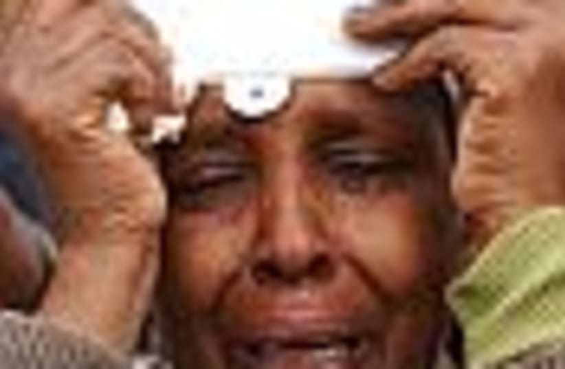 ethiopian woman crying88 (photo credit: )