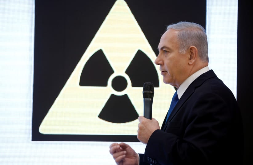 Israeli Prime minister Benjamin Netanyahu speaks during a news conference at the Ministry of Defense in Tel Aviv, Israel, April 30, 2018 (photo credit: AMIR COHEN/REUTERS)