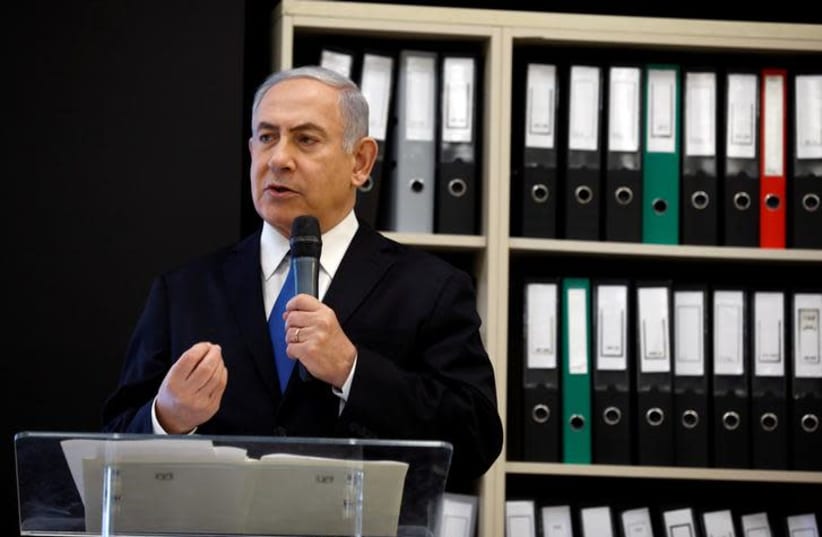 Prime minister Benjamin Netanyahu speaks during a news conference at the Ministry of Defence in Tel Aviv, Israel, April 30, 2018 (photo credit: REUTERS/AMIR COHEN)