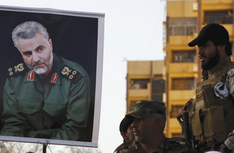 A POSTER of Iranian Quds Force leader Qassem Suleimani. (photo credit: REUTERS)