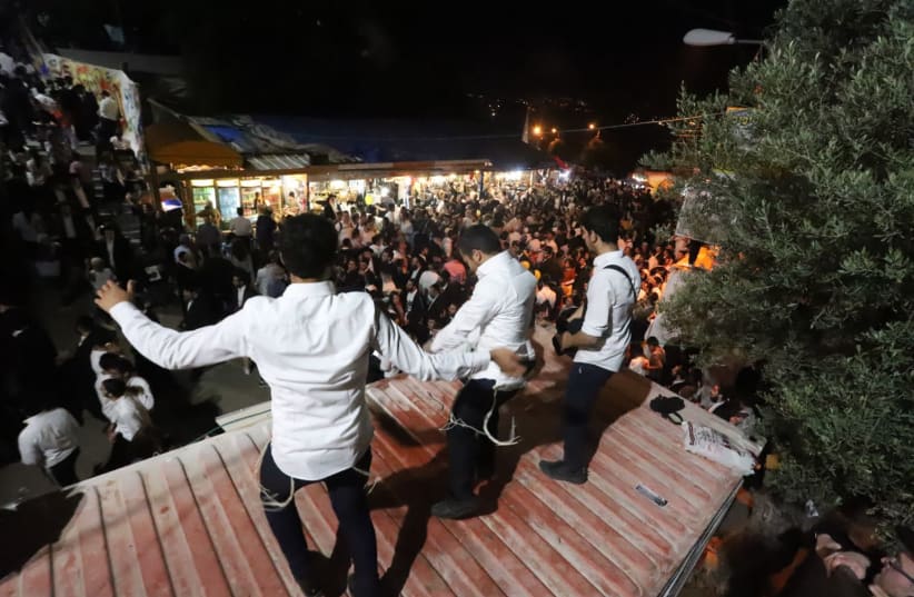 Thousands celebrate Lag BaOmer in the northern Israeli city of Meron (photo credit: EITAN ELHADAZ/TPS)