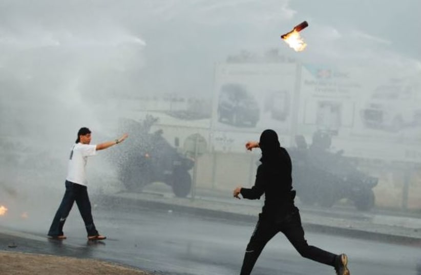 PROTESTERS CLASH with police in Bahrain during 2011 Arab Spring protests (photo credit: REUTERS)