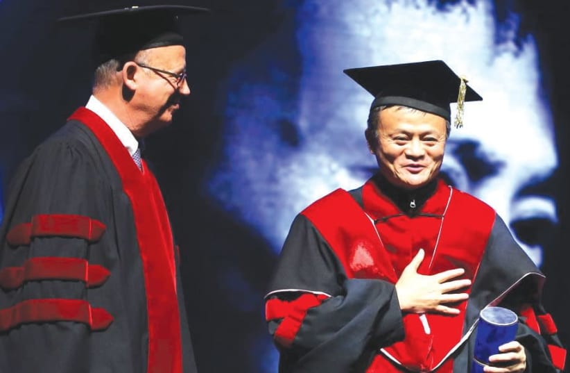 JOSEPH KLAFTER (left) and Jack Ma (photo credit: CHEN GALILI)