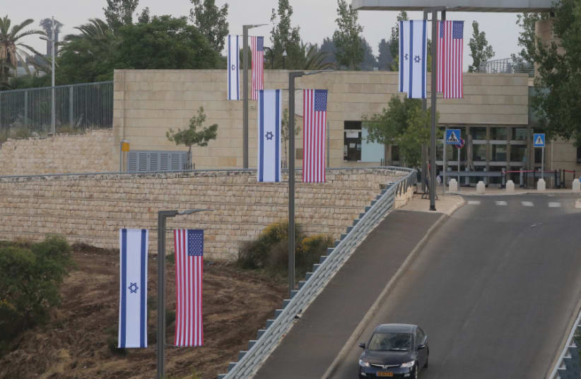 Side-by-side Israeli and American flags line the road down from the US Consulate General in the Arnona neighborhood (photo credit: REUTERS)