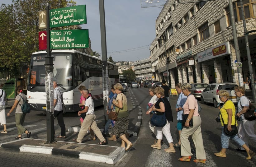 People walking in Nazareth  (photo credit: REUTERS)