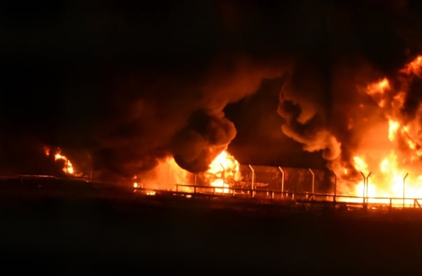 Kerem Shalom crossing burning on the Palestinian side after Friday protests  (photo credit: IDF SPOKESMAN’S UNIT)
