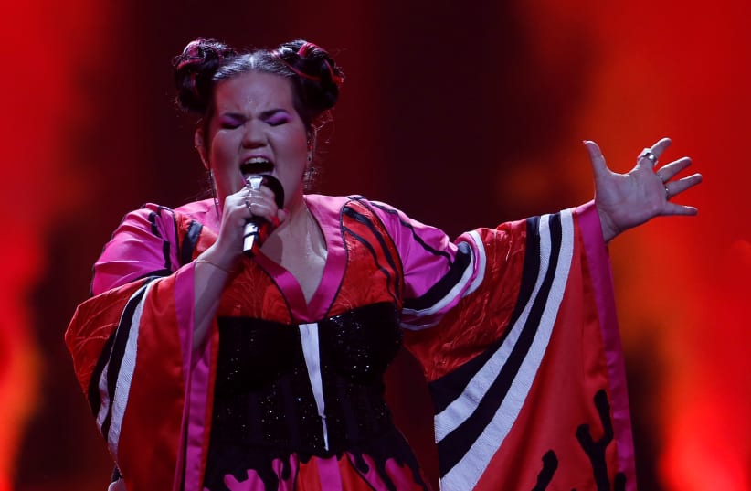 Israel's Netta performs "Toy" during the Grand Final of Eurovision Song Contest 2018 at the Altice Arena hall in Lisbon, Portugal, May 12, 2018 (photo credit: REUTERS/PEDRO NUNES)