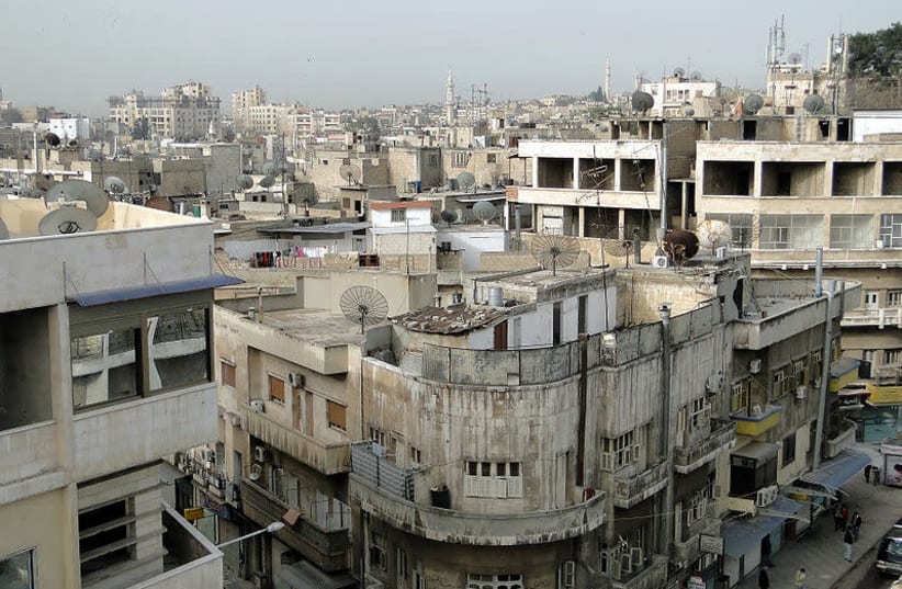 Hama, Syria [file photo] (photo credit: BERNARD GAGNON- WIKIMEDIA)