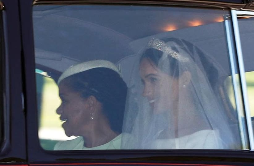 Meghan Markle with her mother Doria Ragland departs for her wedding to Britain's Prince Harry, in Taplow, Britain, May 19, 2018 (photo credit: DARREN STAPLES/REUTERS)