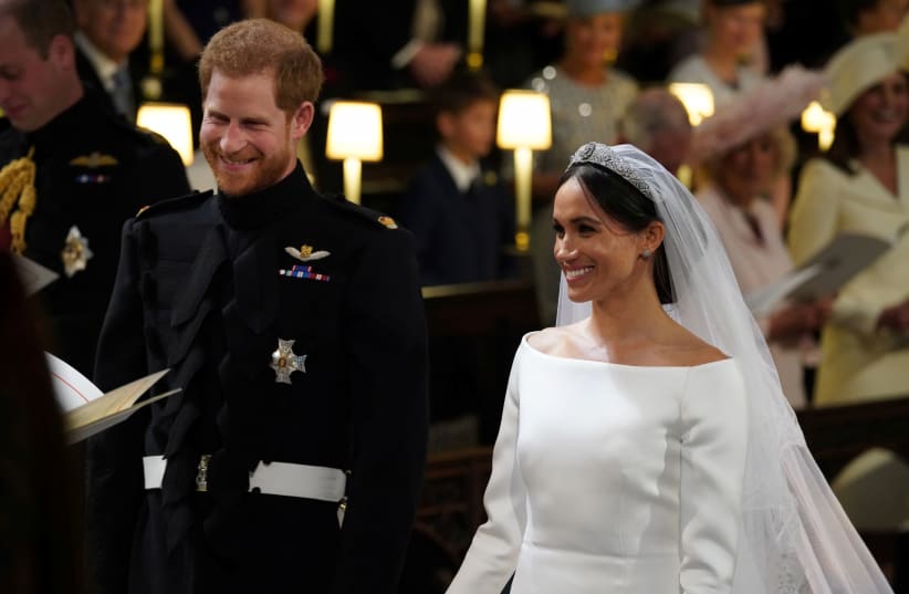 His Royal Highness Prince Harry, Duke of Sussex and Her Royal Highness Meghan Markle, Duchess of Sussex, at their wedding (photo credit: POOL)