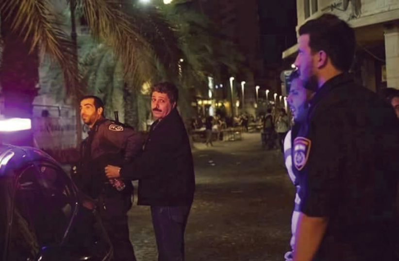 Police arrest Jafar Farah, director of the Mossawa Center, in Haifa on Friday night. (photo credit: MOSSAWA CENTER)